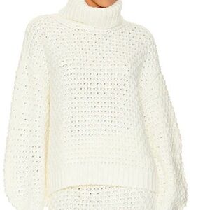 JERSEY CABLE TURTLENECK
Lovers and Friends